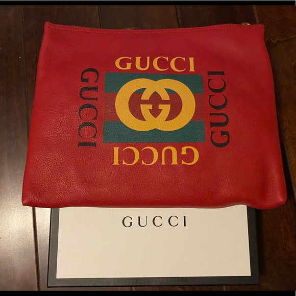 Gucci
Logo Portfolio Pouch Printed Leather Large Clutch - Picture 1 of 4